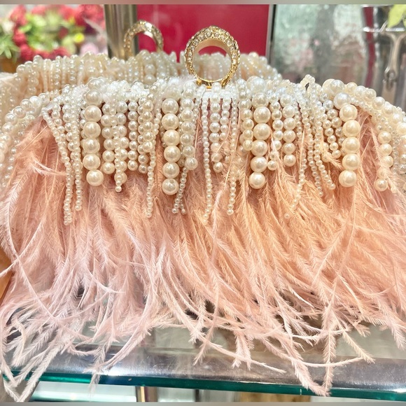 Ostrich feather light pink with diamond ring clutch comes with strap. - Picture 1 of 2